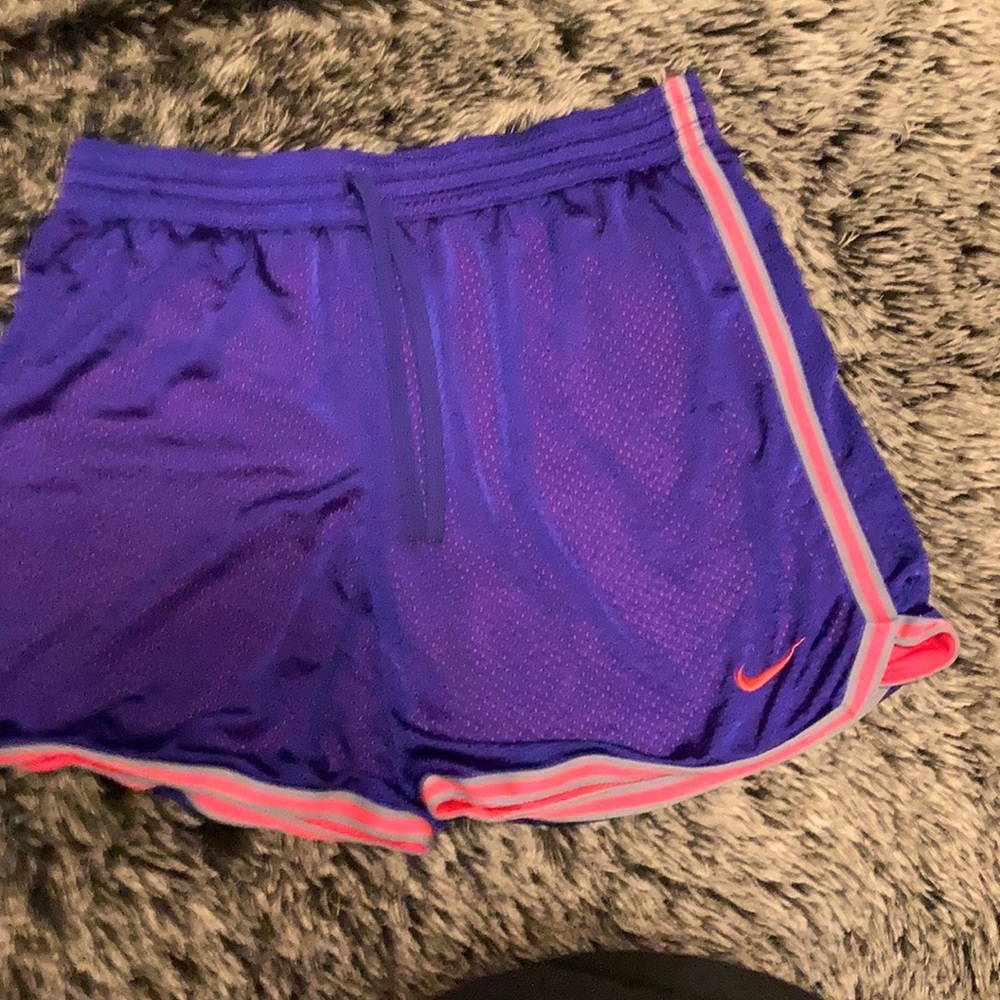 Women’s Basketball shorts purple and hot pink.